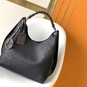 Casually slung over the shoulder for an especially stylish look, featuring an oversized, shiny palladium-plated copper twist lock closure that adds a touch of avant-garde flair. Dimensions: 35.0 x 40.0 x 17.0 cm, 202075